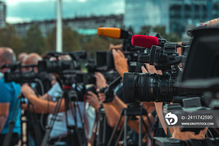 Group of Cameras at an Outdoor Event