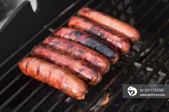 Hot dogs on grill