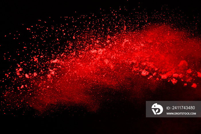 Abstract red powder splatted background,Freeze motion of color powder exploding color powder.