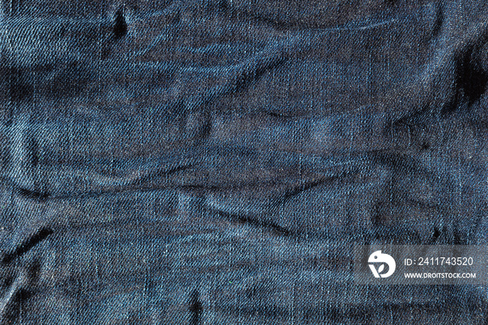 Navy blue jeans cloth textured pattern. Denim background.