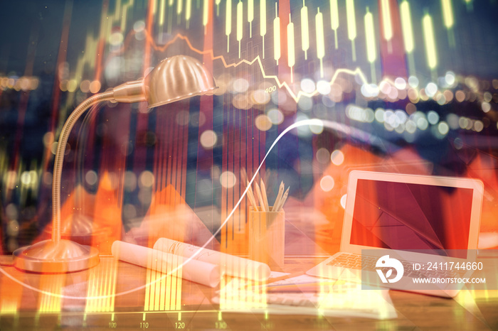 Financial chart drawing and table with computer on background. Multi exposure. Concept of international markets.