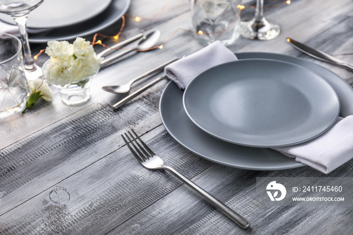 Beautiful table setting on wooden background