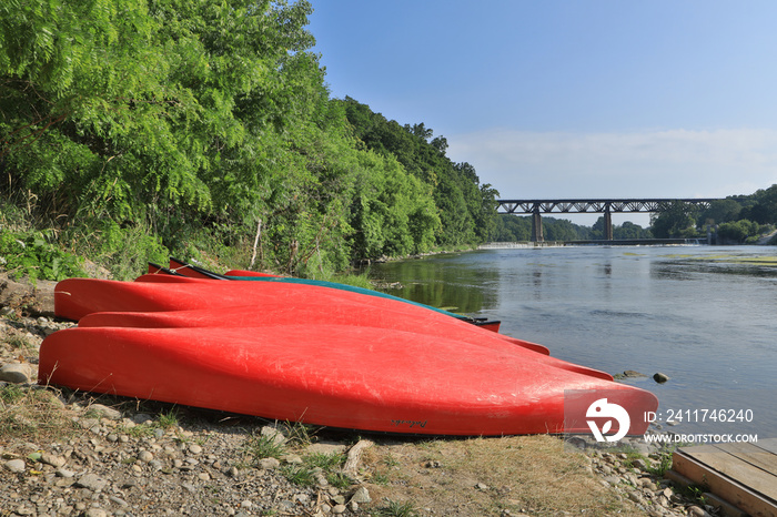 Grand River at Paris, Ontario, Canada with canoes in foreground