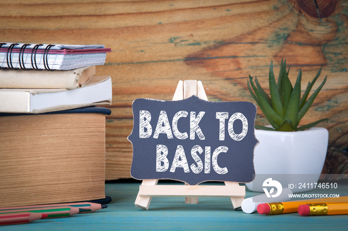 back to basic. small wooden board with chalk on the table