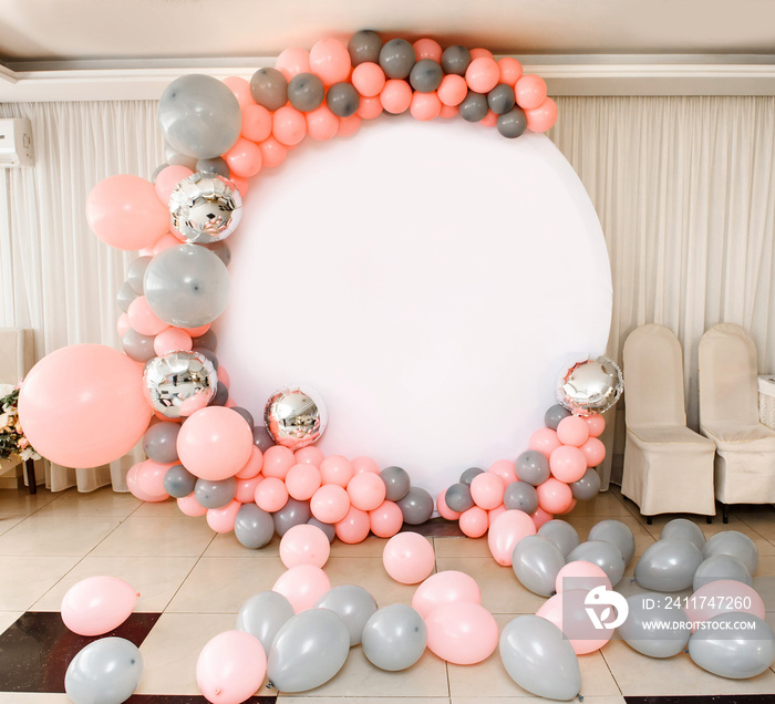 Close up the photo zone from pink and grey balloons with white copy space for your text.