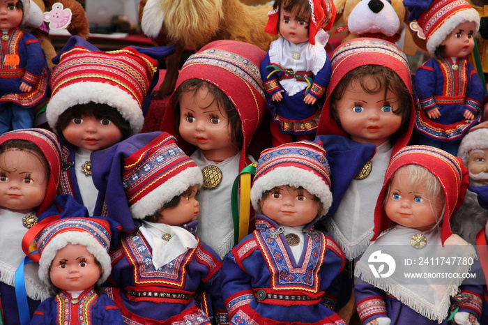 A collection of Saami dolls dressed in traditional Lapland clothing, sold as souvenirs in Finland.