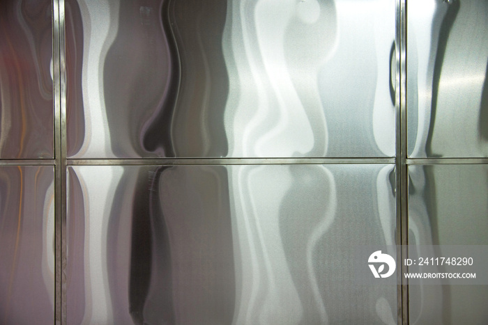 abstract pattern on metal plates of stainless steel