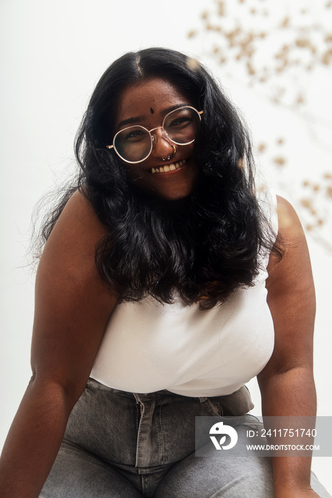 South Asian female solo lifestyle studio portrait shot