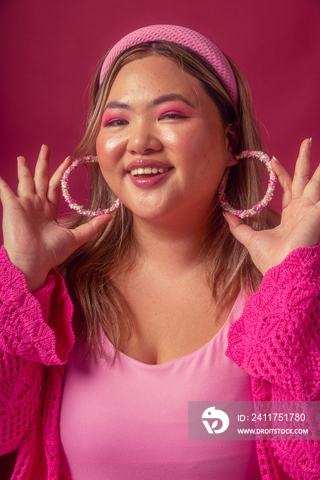 Asian individual fashion colour-blocked studio portrait