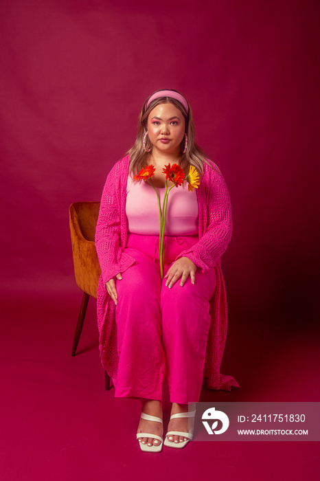 Asian individual fashion colour-blocked studio portrait