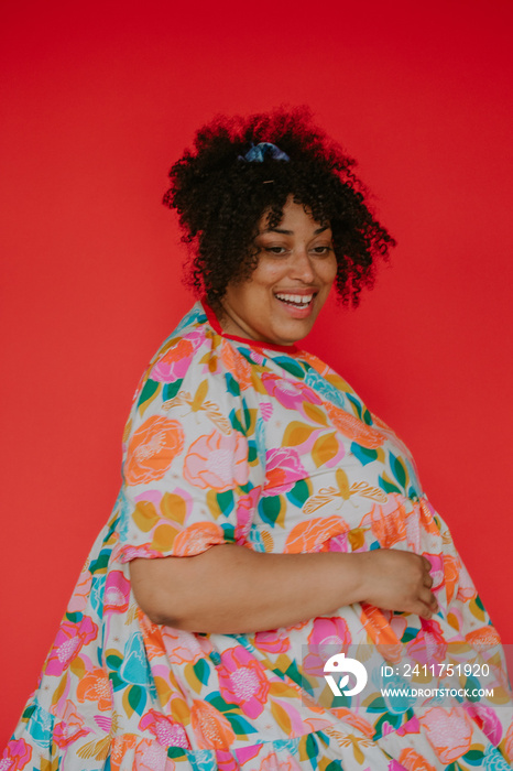 portrait of a plus size person smiling