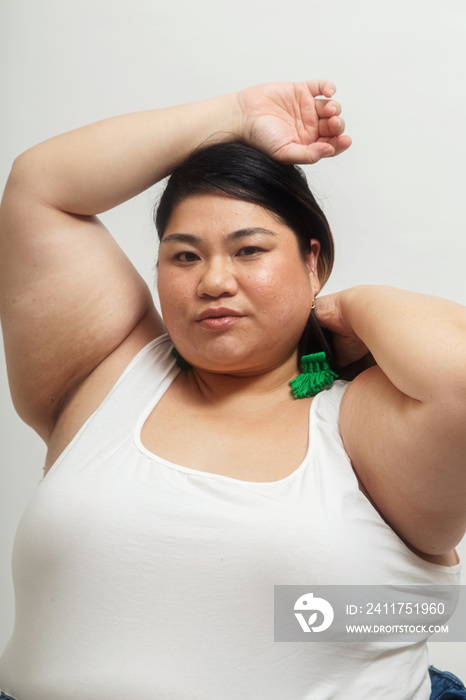 Asian plus size female solo lifestyle studio portrait shot