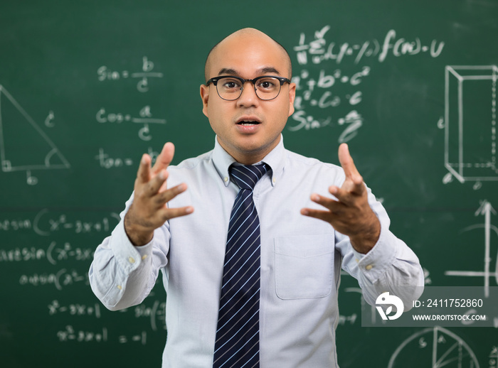 Young asian teacher man teaching video conference with student. Male Indian teacher training the mathematics in classroom from online course.