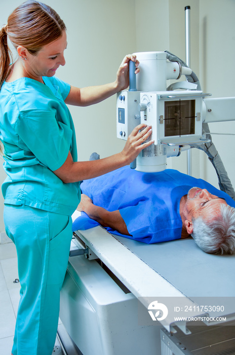 Elderly man undergoing medical scan at hospital