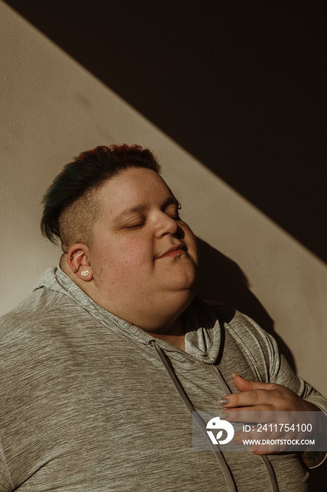 portrait of a plus size person in the light