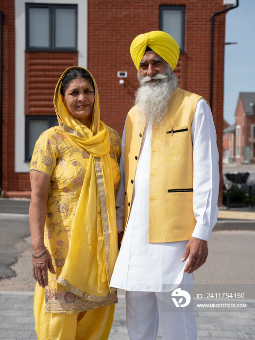 Portrait of senior couple in traditional clothing