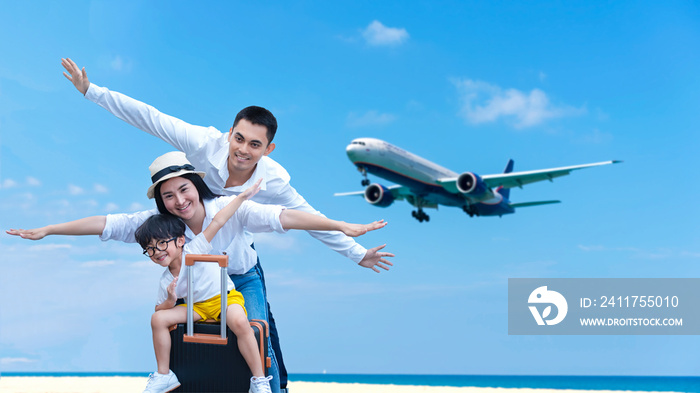 Asian happy family have fun on the beach watching the landing planes. Traveling on an airplane for leisure and destination place Phuket Thialnd Asia.  Family tourism travel in summer and holiday.