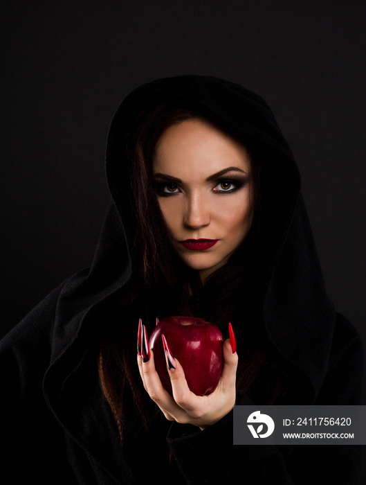 Stepmother witch gives poisoned red apple