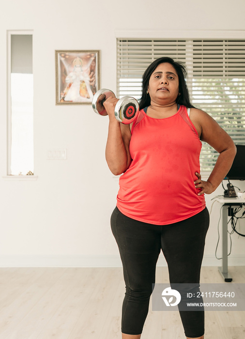 South Asian woman working out