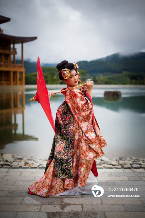 Young women wearing traditional Japanese Kimono at Japanese castle