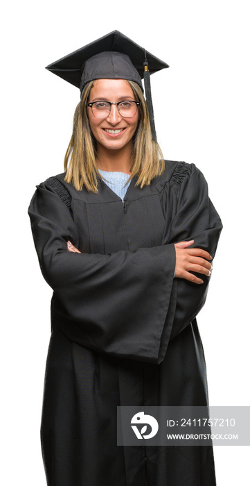 Young beautiful woman wearing graduated uniform over isolated background happy face smiling with crossed arms looking at the camera. Positive person.