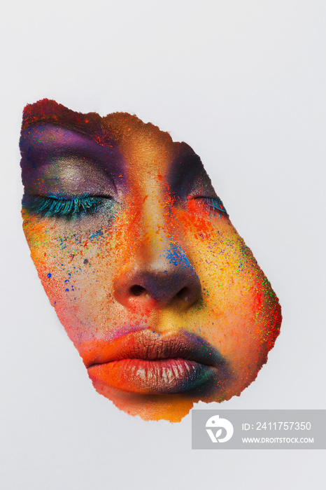 Face of model with colorful art make-up, close-up