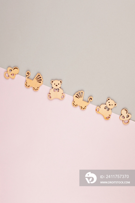 Minimal pastel decorative background with small wooden figures for newborn birthday