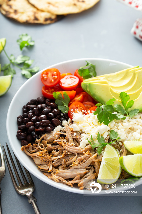 Pork carnitas bowl or burrito bowl with rice