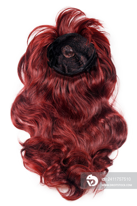 Female long curly red wig isolated on white background. Red hair weaves, extensions and wigs. Hairstyle, haircut or dying in salon. Woman beauty concept.