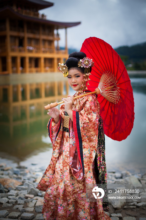 Young women wearing traditional Japanese Kimono at Japanese castle