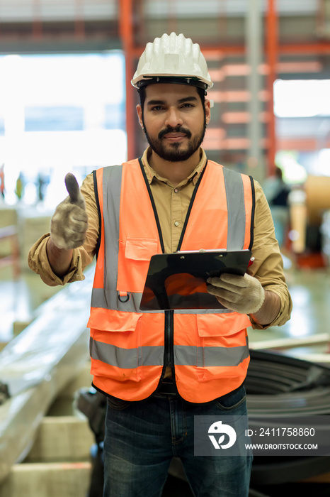 Foreman or worker work at factory site check up machine or products in site. Engineer or Technician checking Material or Machine on Plant. Industrial and Factory.