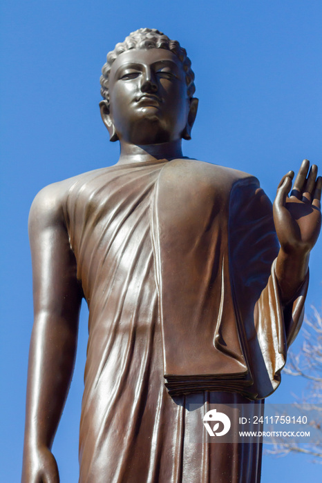 The Buddha Statue in Leela Attitude at Santacittarama, Buddhist monastery in Rieti,Lazio. The attitude is sometimes called the Walking Buddha.A Buddhist Temple in Italy