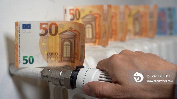 Europe, Italy , Increase in the cost of bill for  gas and electricity causes increased price for the procurement of raw materials, money euro banknote and domestic heating radiator