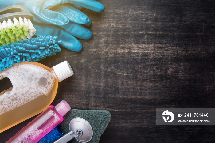 Cleaning products and tools on a wooden floor,Cleaning concept