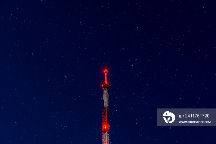 radio tower on night starry sky background