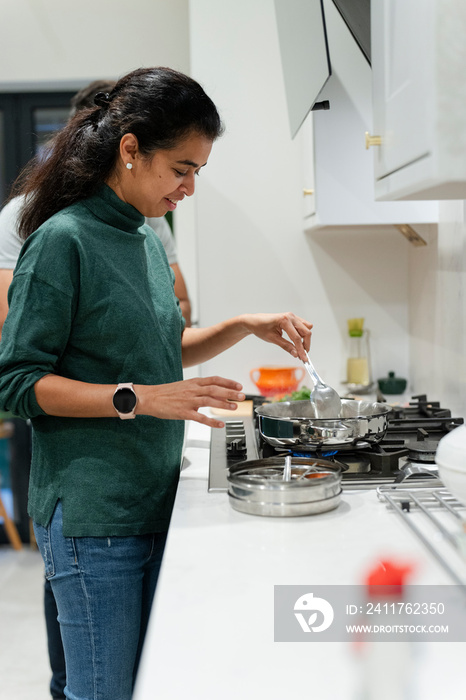 Woman cooking at home