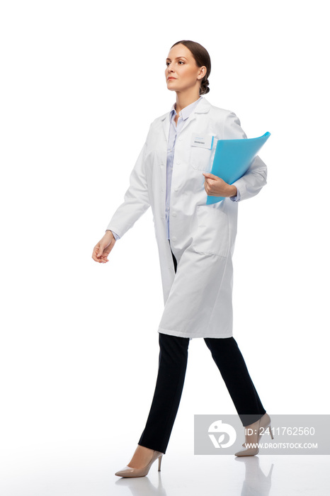 medicine, profession and healthcare concept - female doctor or scientist in white coat walking with folder