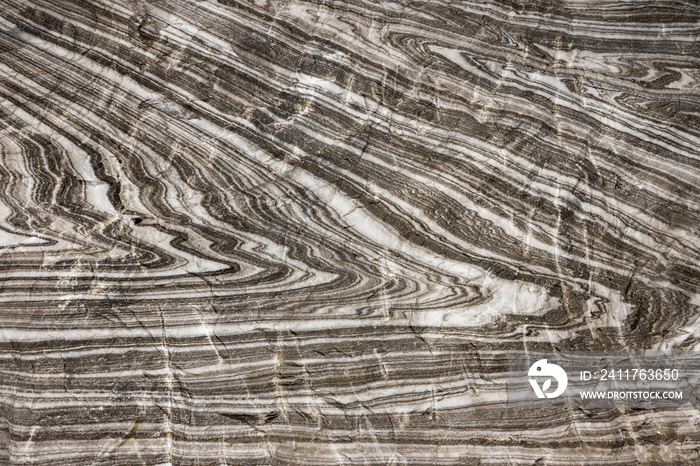 Abstract gray texture of natural, raw salt in an underground salt mine