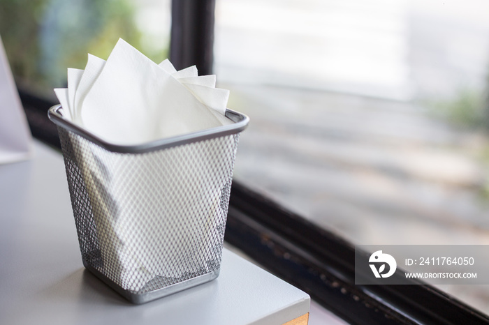 Tissue in basket on the table in the restaurant