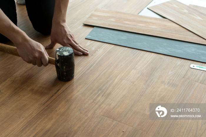 wooden vinyl floor tile installing on site by contractor : interior decorate concept