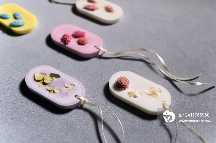 Group of Colorful Florentine Sachets with Dried Flowers close-up. Subject Shooting of Products.