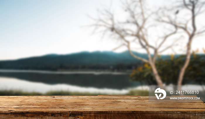 Empty top of wooden shelves on sky mountain and river trees front view background. For product display blur background image, for product display montage.