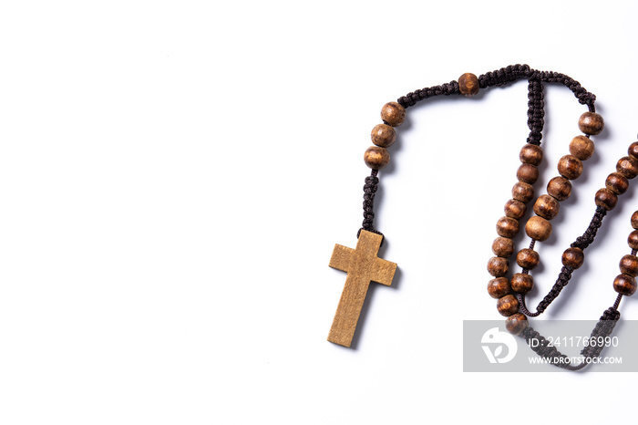 Rosary cathloic cross isolated on white background. Copy space