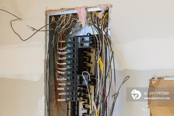 Electrical cabinet with circuit breaker on the mounting panel holders the wires in cable