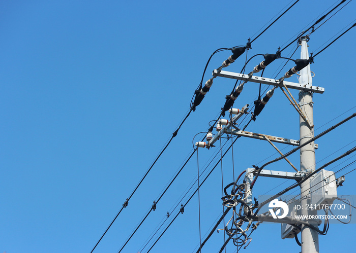 Japanese high vottage electric pole with sky background.