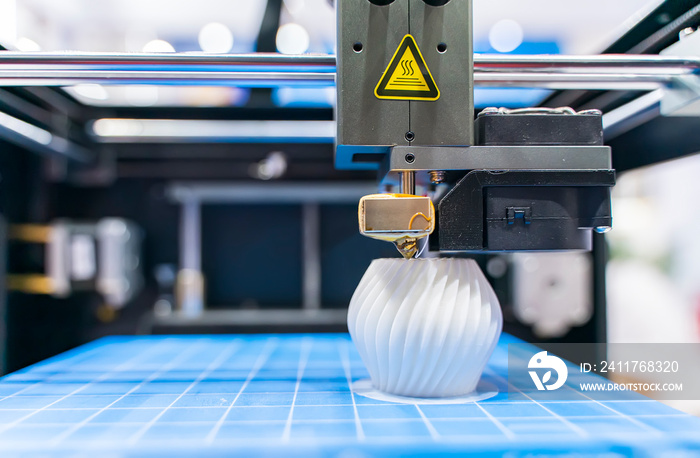 3D printer or additive manufacturing and robotic automation technology.