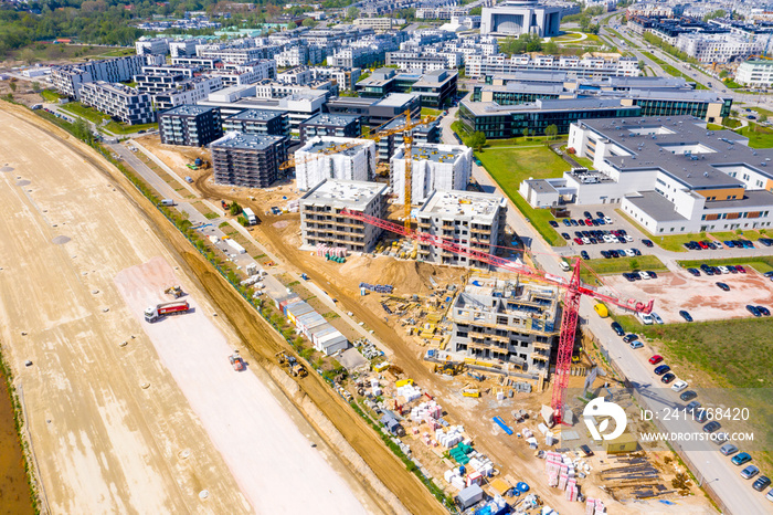 Construction site with cranes. Construction workers are building.Aerial view.Top view.