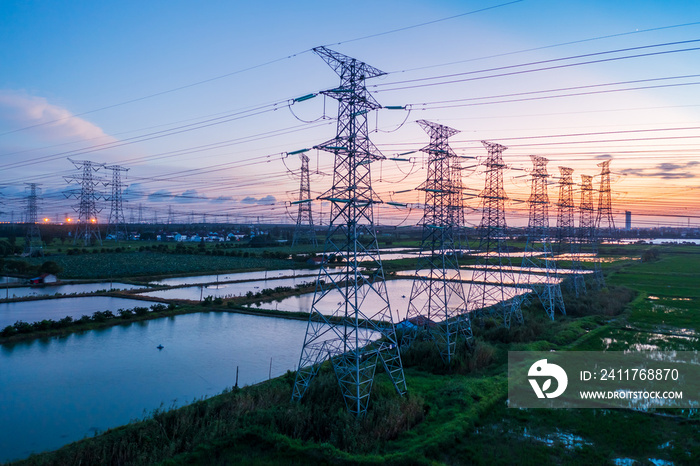 Aerial view of high voltage power tower.