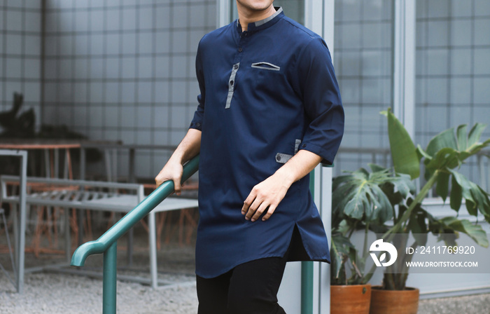 Stylish moslem man wearing kurta shirt or koko shirt