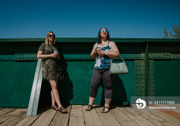 2 friends standing outside